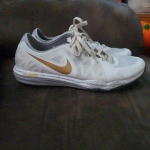 White and Gold Nike Tennis Shoes